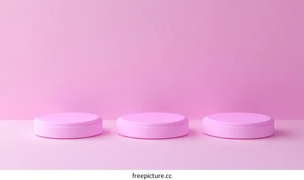 Three Pink Round Platforms on Pink Background