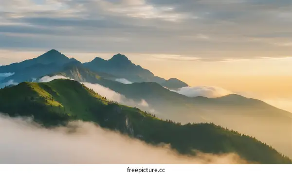 Mountain Range with Morning Mist and Golden Light