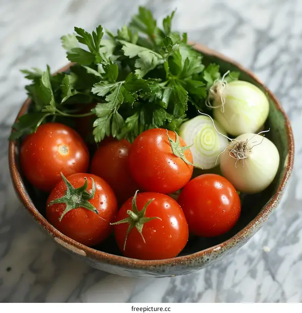 Fresh organic vegetables and herbs in a bowl