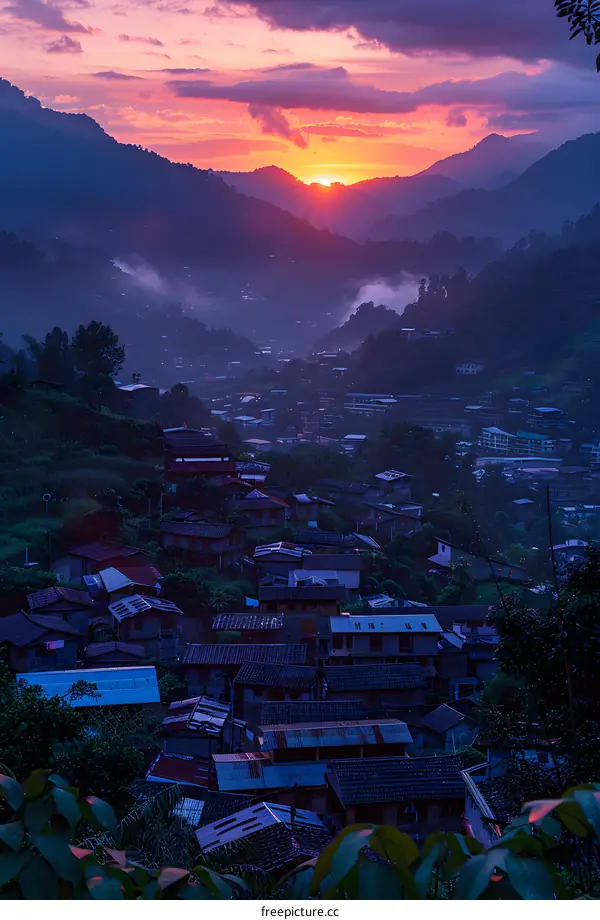 houses on hillside at sunset
