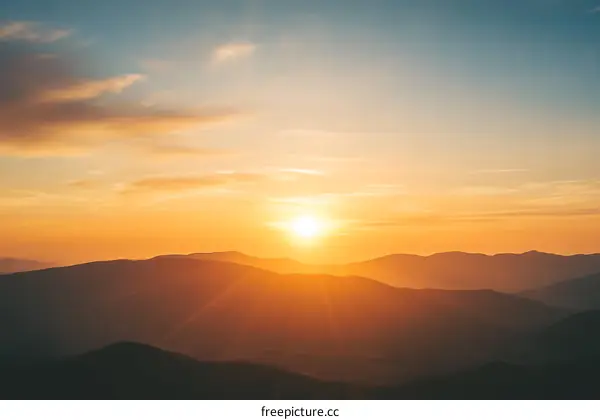 Golden Hour Sunset Over Mountain Range