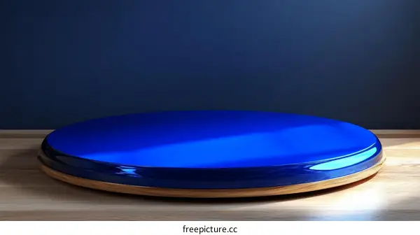 Modern Blue Round Display Platform on Wooden Surface