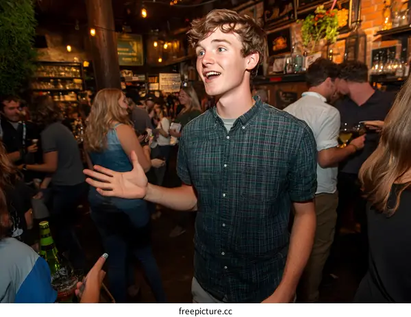 Man in a Plaid Shirt Talking at a Bar