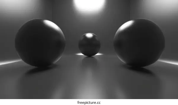 Three Dark Polished Balls in a Minimalist Setting