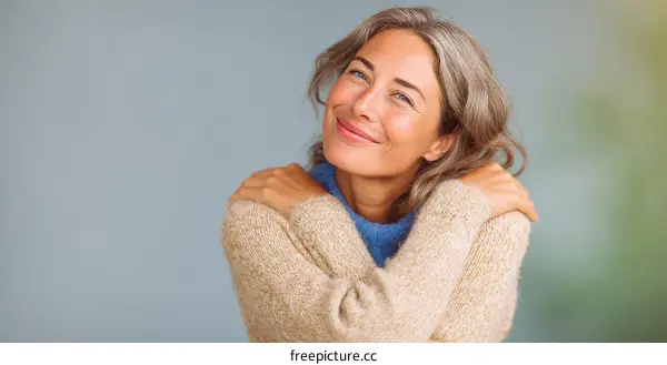 Smiling Woman in a Knitted Sweater