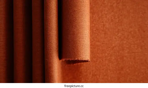 Rolled-up terracotta fabric texture