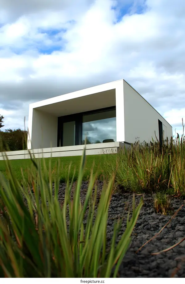 Modern White House with Grass and Sky