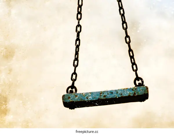 Metal Swing Hanging in the Sky