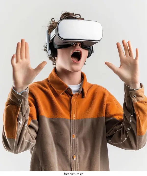 Amazed young male with virtual reality headset