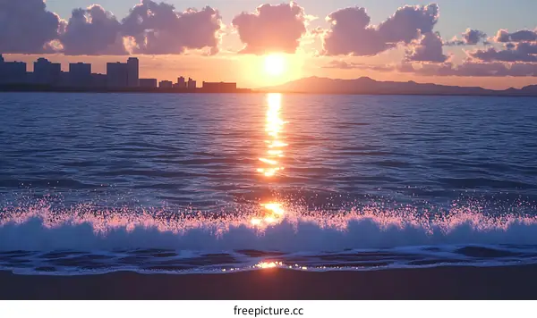 Sunset over the Ocean with City Skyline