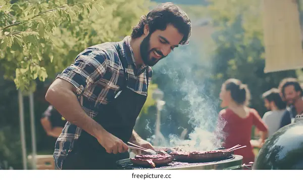 Man Grilling Meat With Friends at Barbecue
