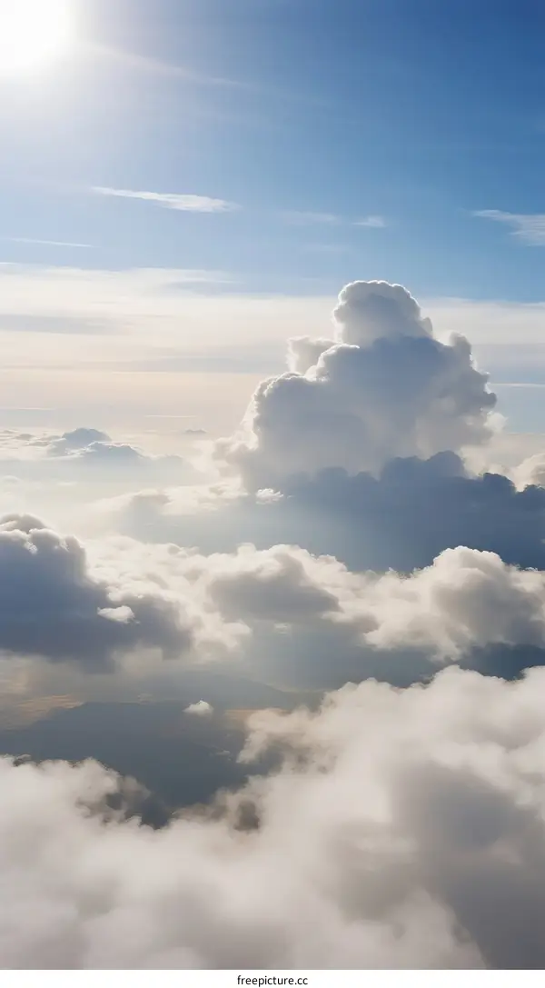 Beautiful Fluffy Clouds Floating Under Bright Sunlight Sky