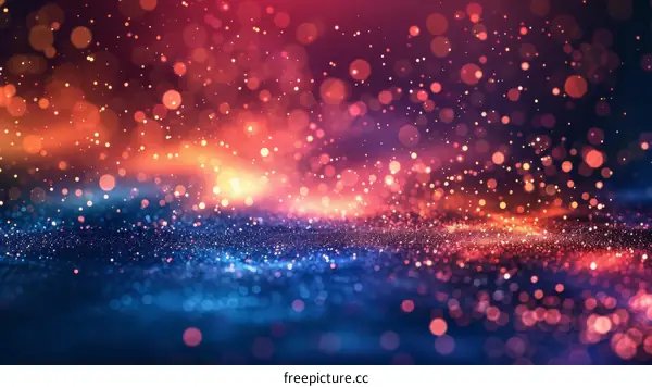 Red and Blue Glitter Particles Forming Waves on Black