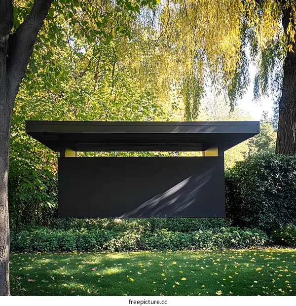 Modern Black Pergola with Green Grass and Trees in Background