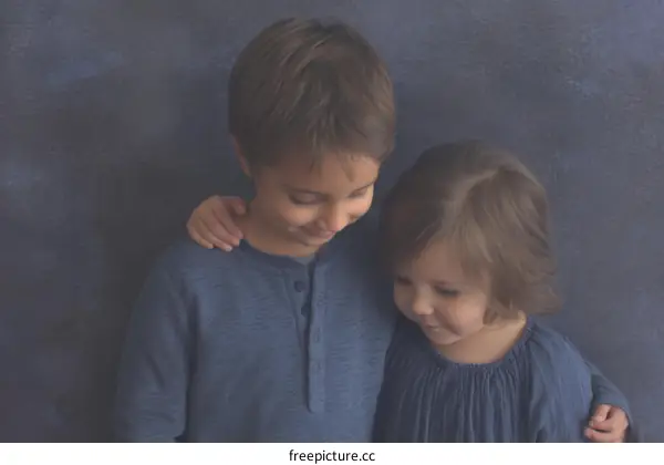 Two siblings embracing, heartwarming moment