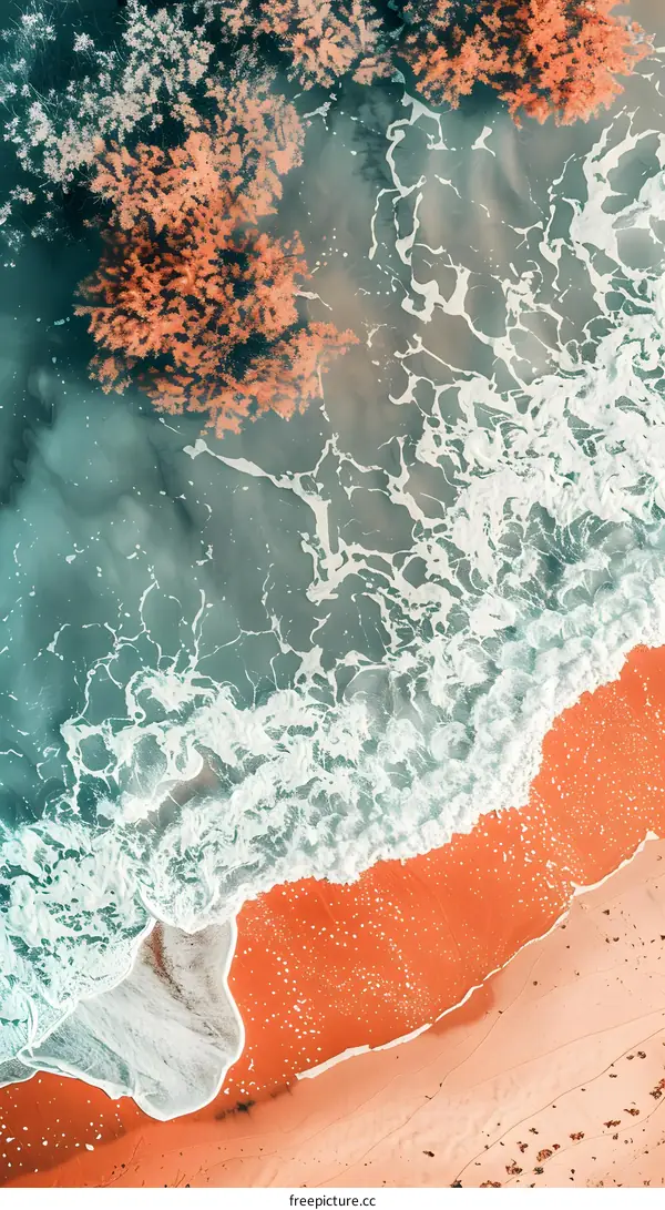 Aerial View of Ocean Waves Crashing on a Sandy Beach
