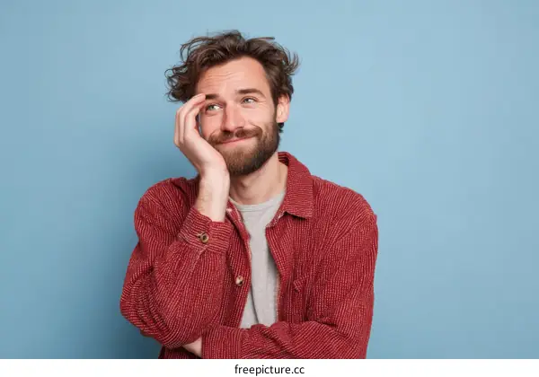 Thoughtful Man in Red Corduroy Jacket