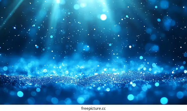 Abstract Blue Glitter Background with Bokeh Effect