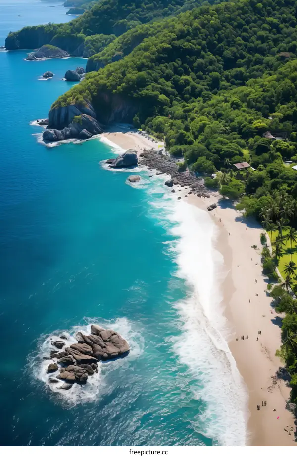 An aerial view of a beach with turquoise water and green vegetation