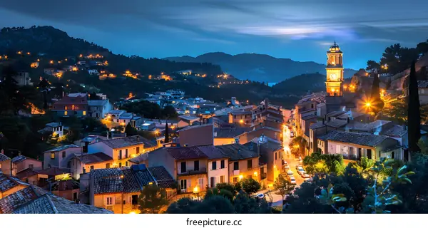 Night View of a European Village with a Clock Tower