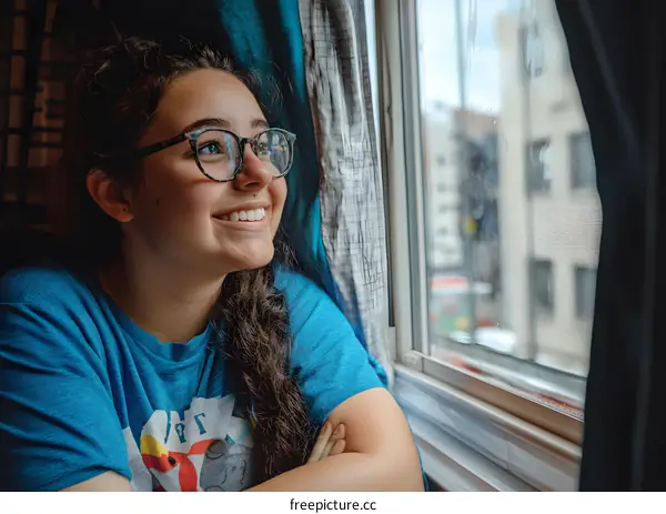 Smiling Girl Looking Out Window