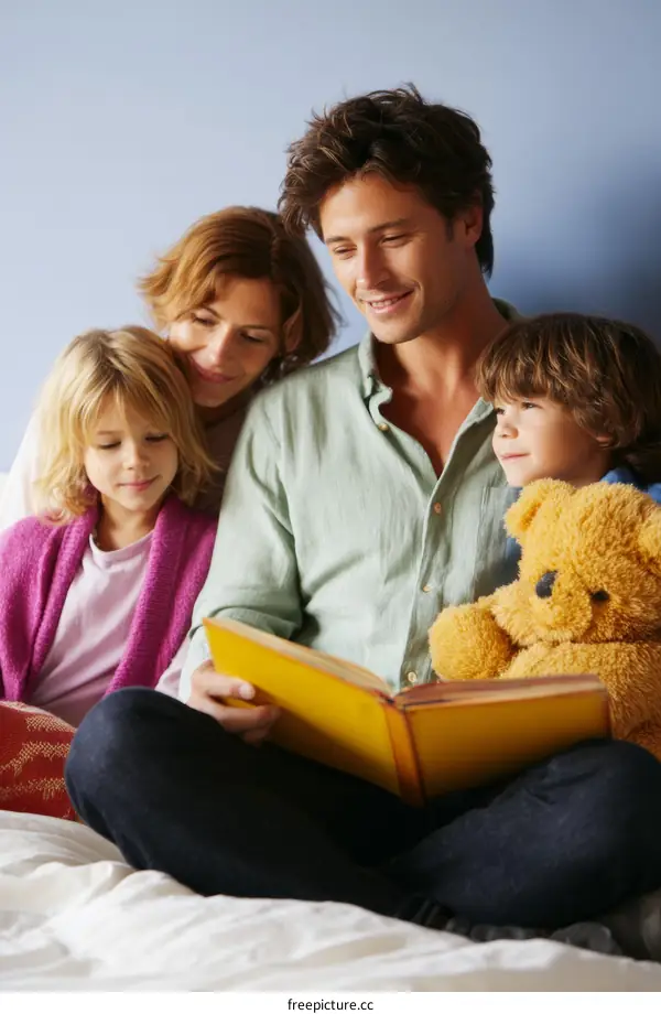 Family Reading a Book Together on Bed