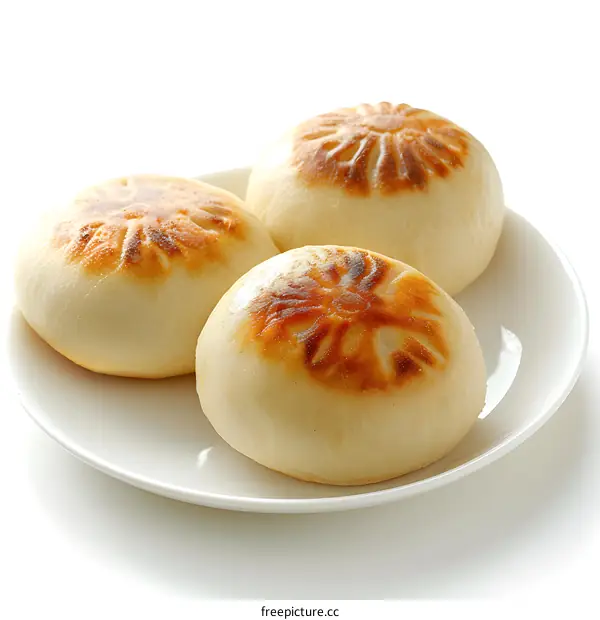 Three Pan Fried Buns on a Plate