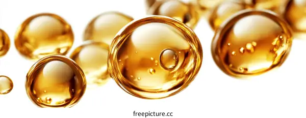 Golden Serum Droplets Close-up