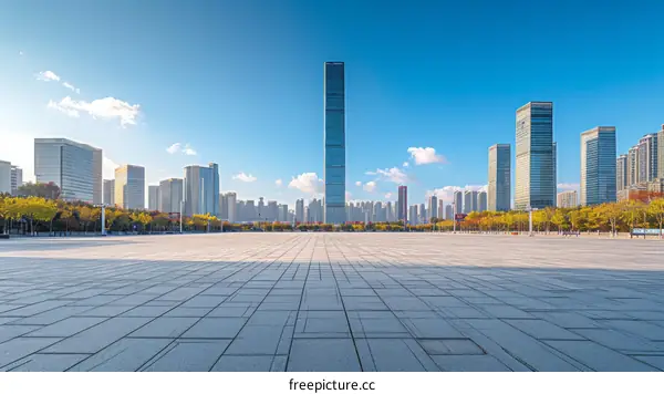 Empty city square with modern buildings in the background