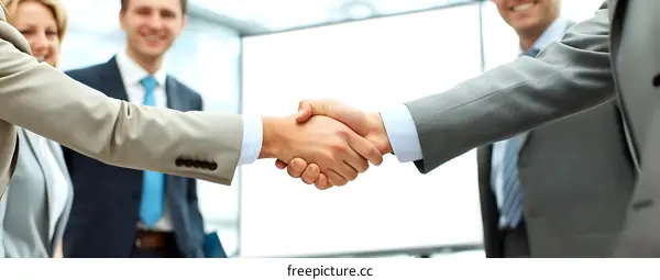 Businessmen Shaking Hands Agreement Partnership Deal
