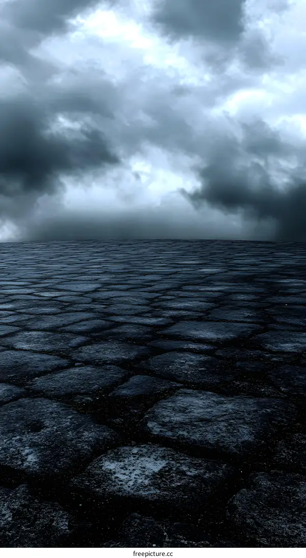 Dark Cloudy Sky Above Cobblestone Road