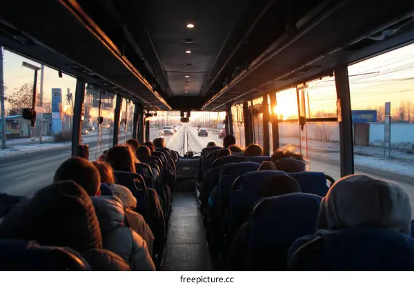 Bus Ride at Sunset with Diverse Passengers