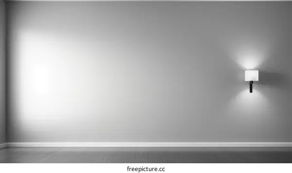 An Empty Room with a Single Lamp on the Wall