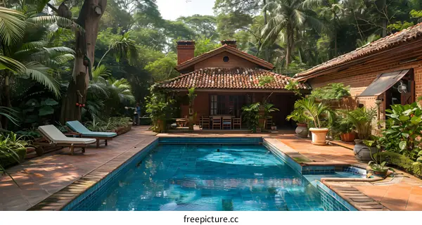 Tropical House with Swimming Pool and Lush Greenery