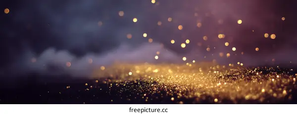 Golden Glitter Background with Bokeh Lights