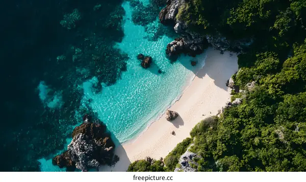 Aerial View of a Secluded Beach with Crystal Clear Water