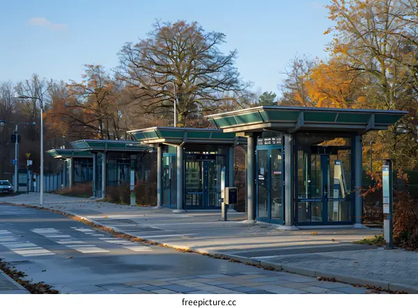 Bus stop with autumn trees in the background