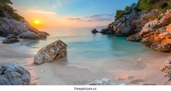 Sunrise over Calm Sea with Rocky Cliffs and Sandy Beach
