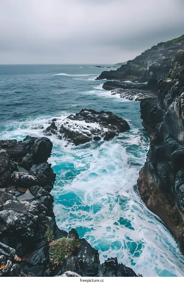 Ocean Waves Crashing Against Rocky Cliffs