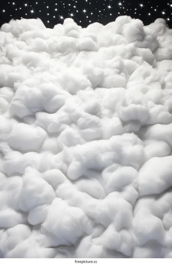 White cotton wool resembling clouds against a starry night sky
