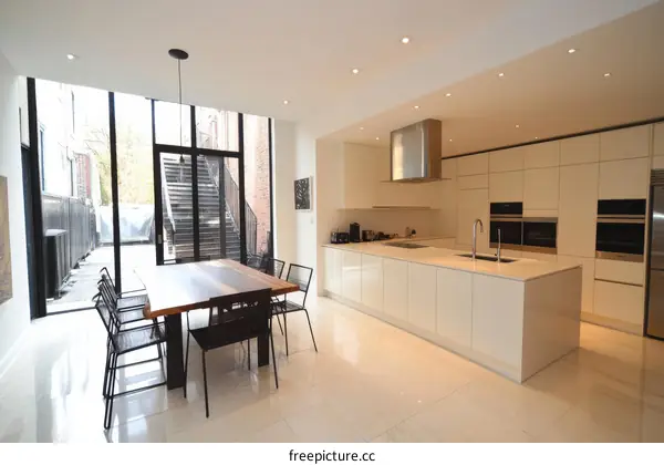 Modern Open-plan Kitchen Dining Area with Courtyard Views