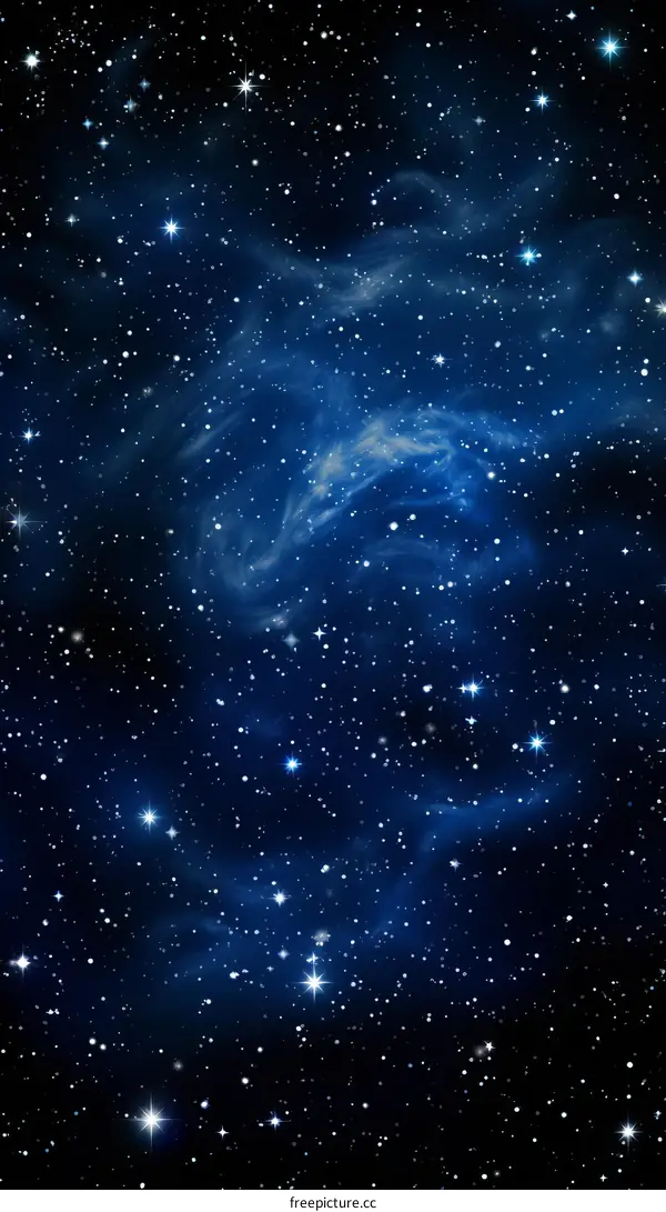 Blue starry night sky with a bright nebula