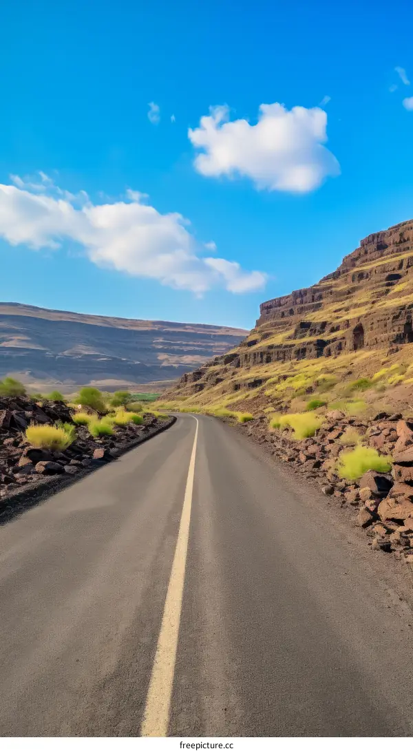 Desolate road through a rocky canyon