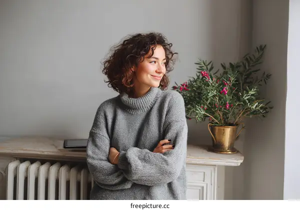 Woman in Grey Knitted Sweater Posing