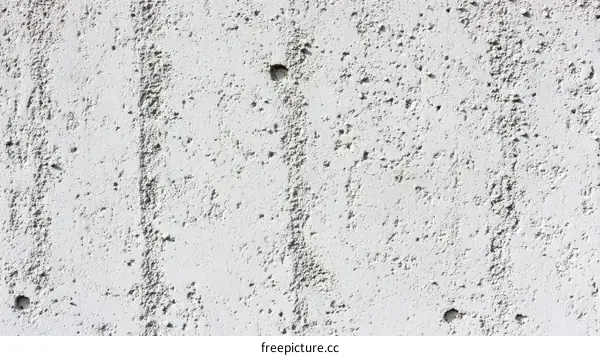 Close-up Texture of a Light Gray Concrete Wall