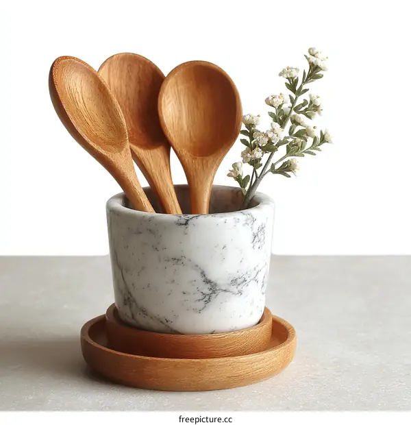Wooden Spoons in Marble Holder with Flowers