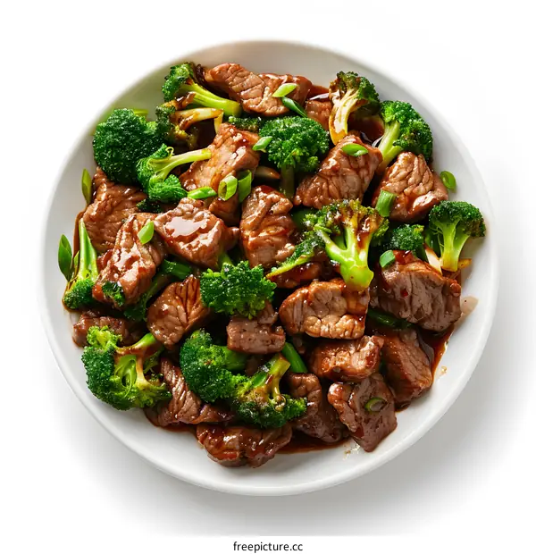 Beef and broccoli stir fry on white plate