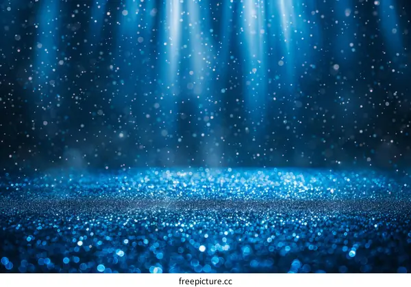Blue glitter texture with shiny light. Blue shiny background