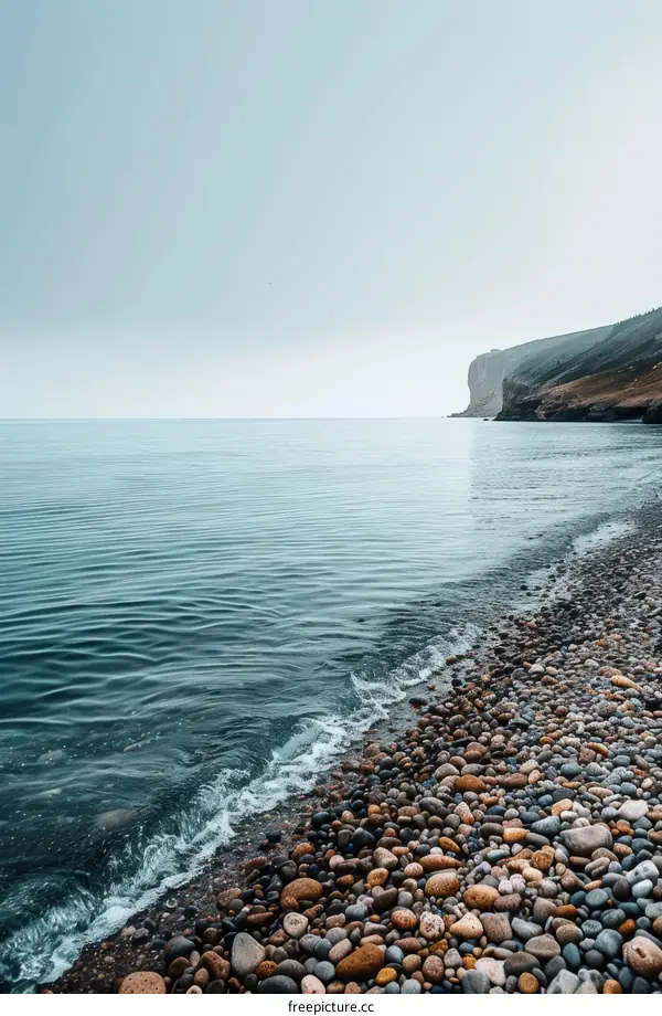 Rocky coast with a distant cliff