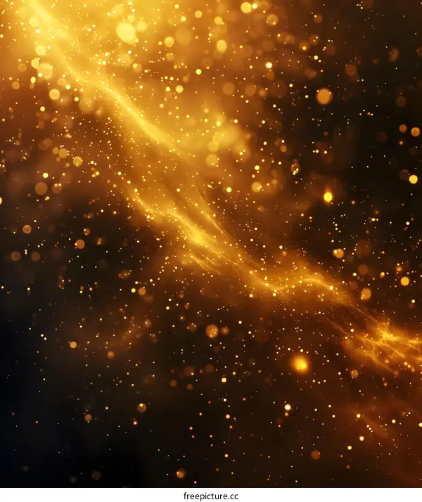 Golden particles form waves on a black background